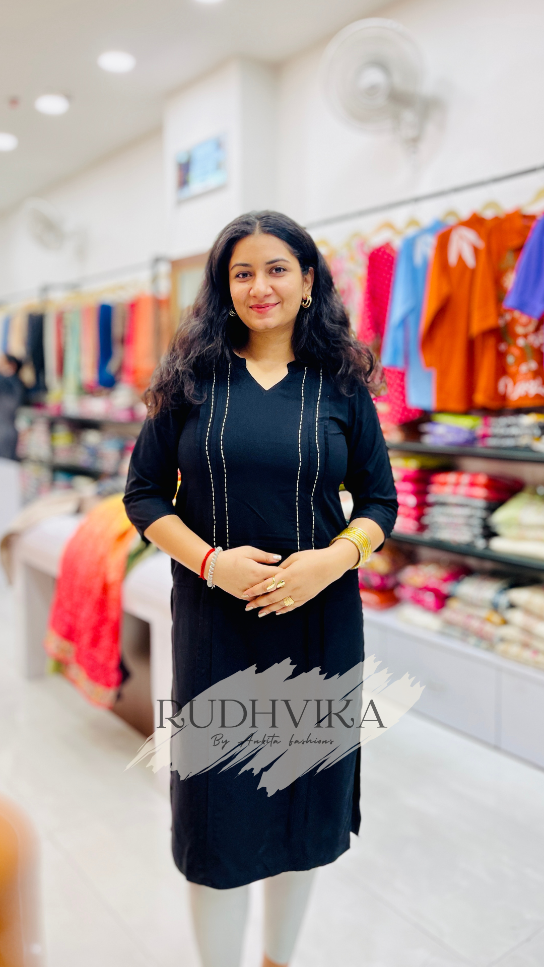 Graceful Black Kurti with Subtle White Stitch Accents